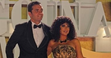 رانيا يوسف تتألق بفستان تايجر برفقة زوجها في مهرجان الجونة السينمائي